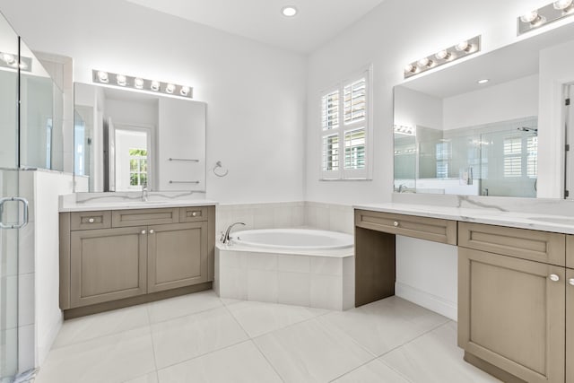 bathroom with vanity, plus walk in shower, and tile patterned floors