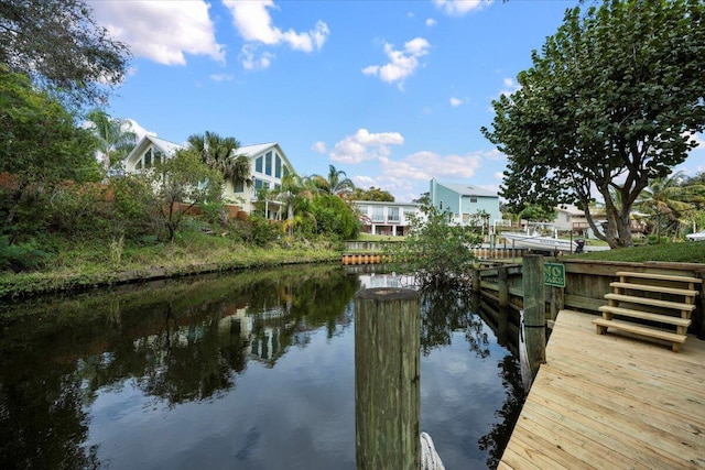 dock area with a water view