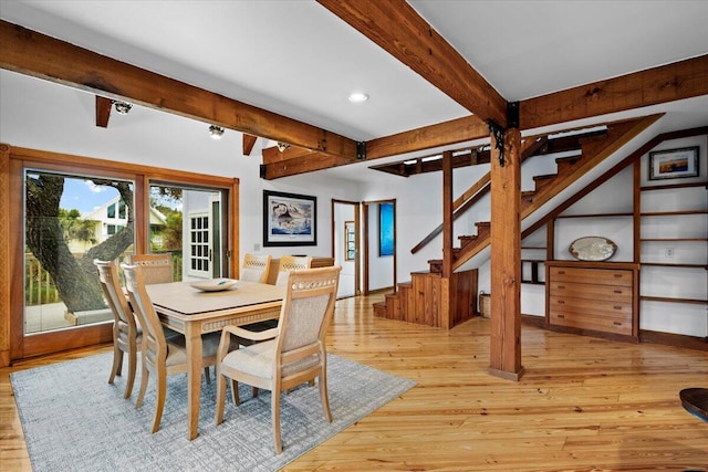 dining area featuring stairway, recessed lighting, beamed ceiling, and light wood finished floors