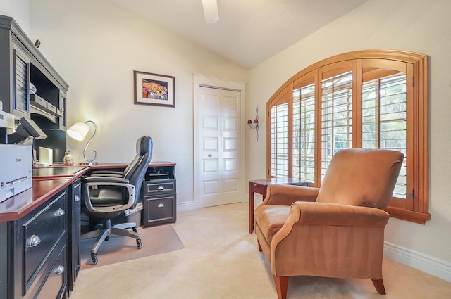 office space with vaulted ceiling