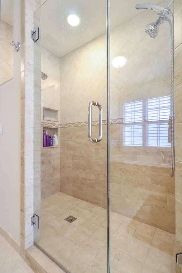 bathroom with walk in shower