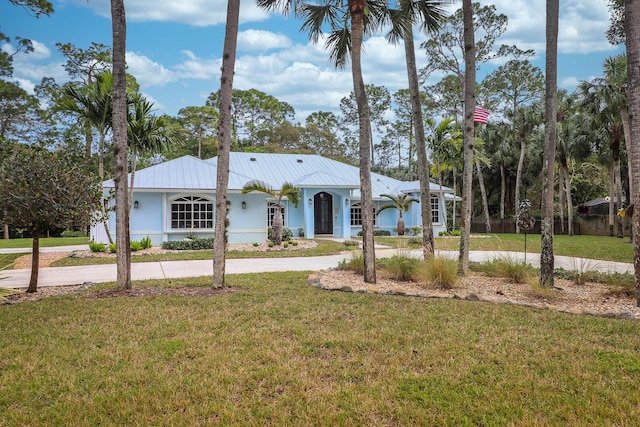 ranch-style home with a front yard