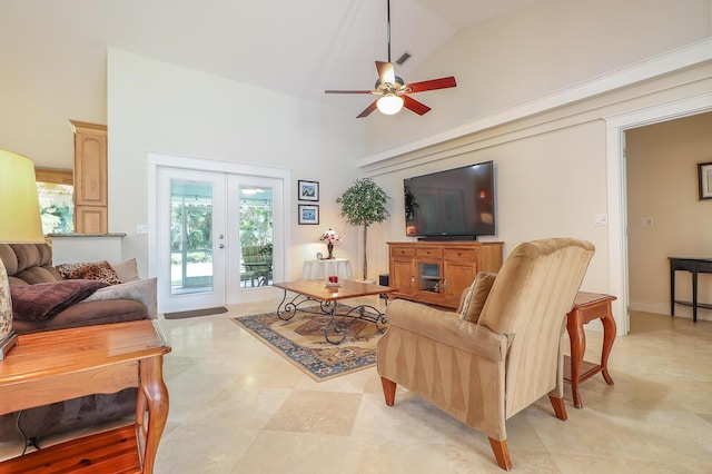 living room featuring ceiling fan, french doors, and lofted ceiling