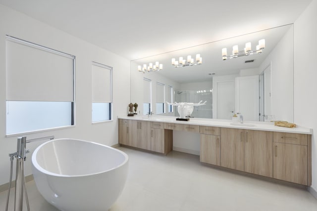 bathroom featuring tile patterned flooring, vanity, and separate shower and tub