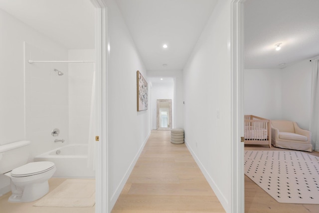 hall featuring light hardwood / wood-style floors