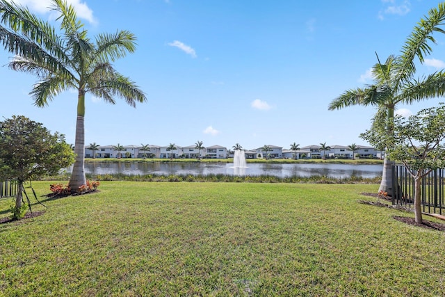 view of yard with a water view