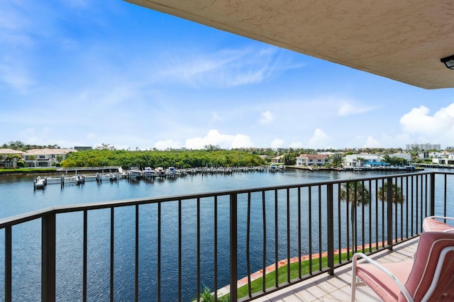 balcony featuring a water view