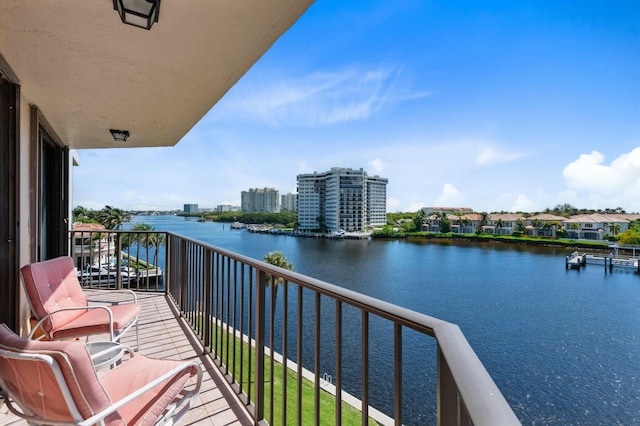 balcony featuring a water view