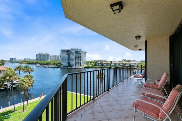 balcony featuring a water view