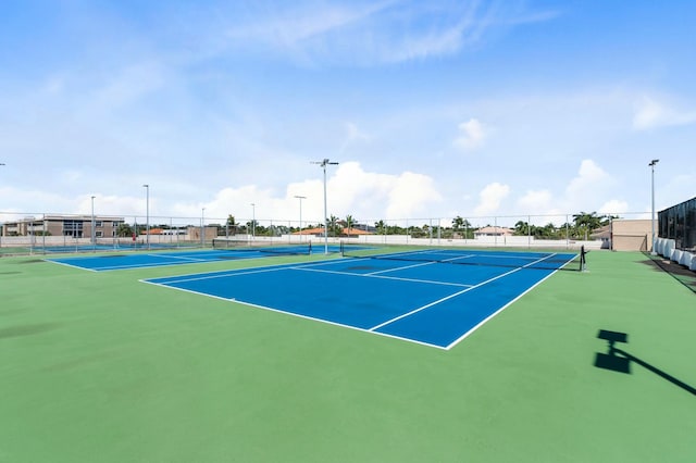 view of tennis court with basketball court