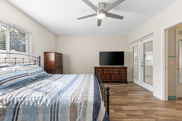 bedroom featuring access to exterior, french doors, ceiling fan, and hardwood / wood-style floors