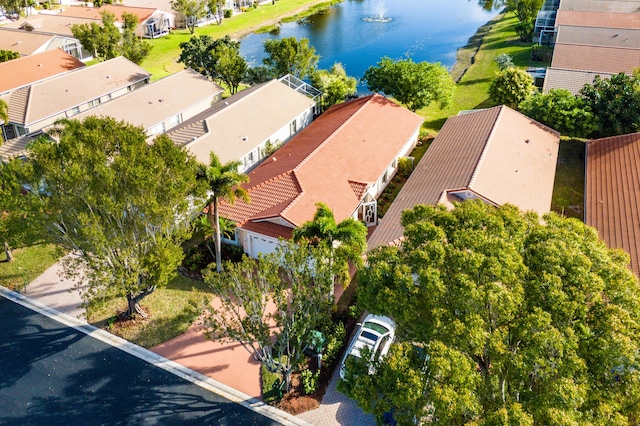 aerial view with a residential view and a water view