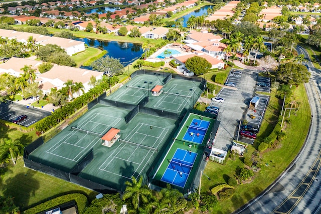bird's eye view featuring a residential view and a water view