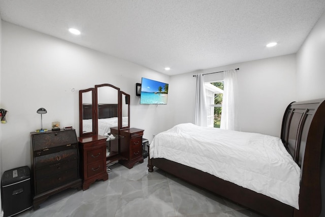 bedroom with a textured ceiling