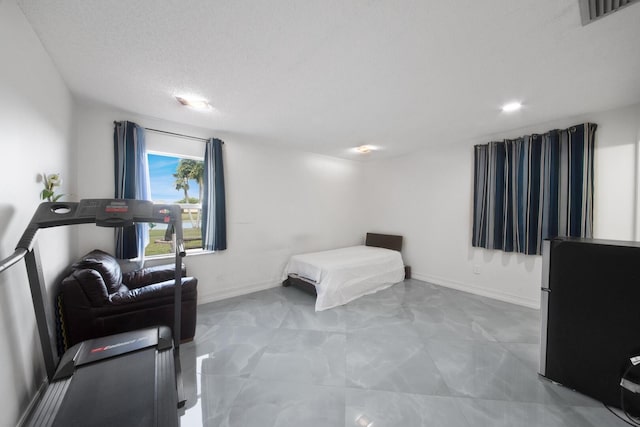 bedroom with a textured ceiling