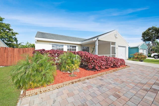 ranch-style home with a garage