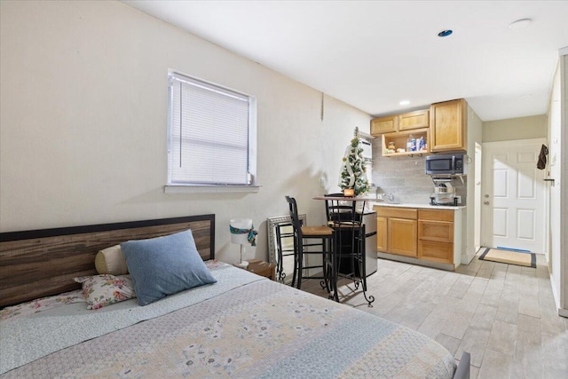 bedroom featuring light hardwood / wood-style flooring