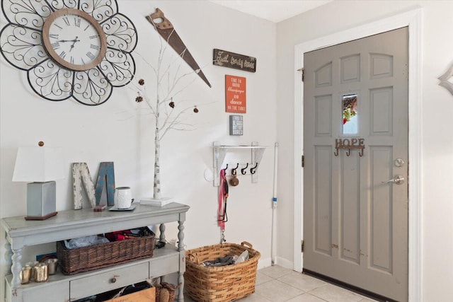 foyer featuring light tile patterned floors