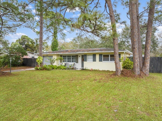 ranch-style house with a front yard