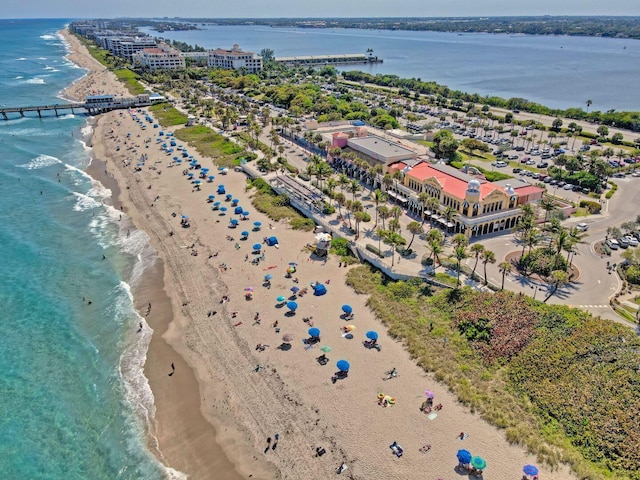 aerial view with a beach view and a water view