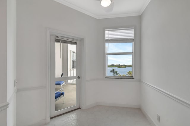 doorway to outside featuring crown molding and light tile patterned flooring