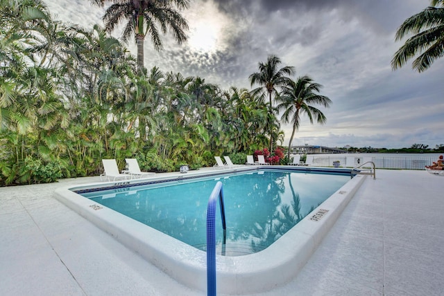 view of swimming pool featuring a patio