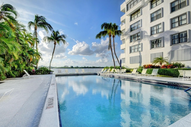 view of swimming pool with a patio