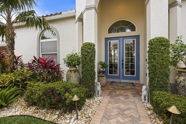 property entrance featuring french doors