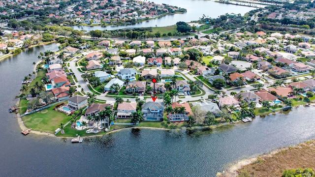 drone / aerial view featuring a water view