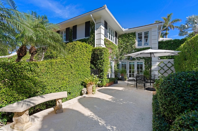 exterior space with french doors and a patio area