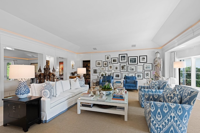 carpeted living room featuring lofted ceiling