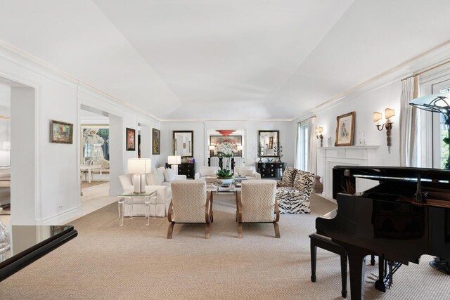 living room featuring light colored carpet and ornamental molding