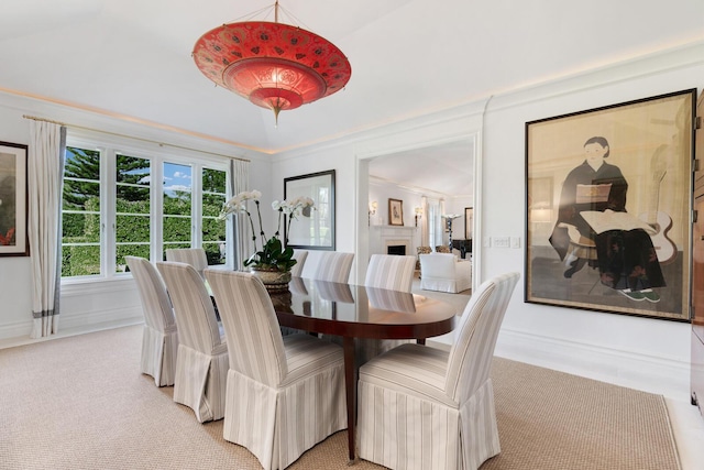 dining space with light colored carpet