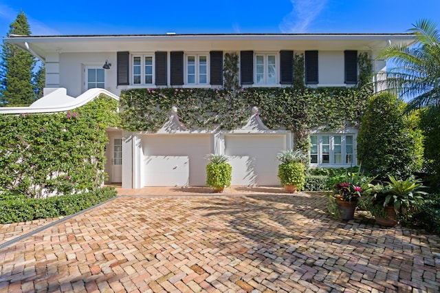 view of front of property featuring a garage