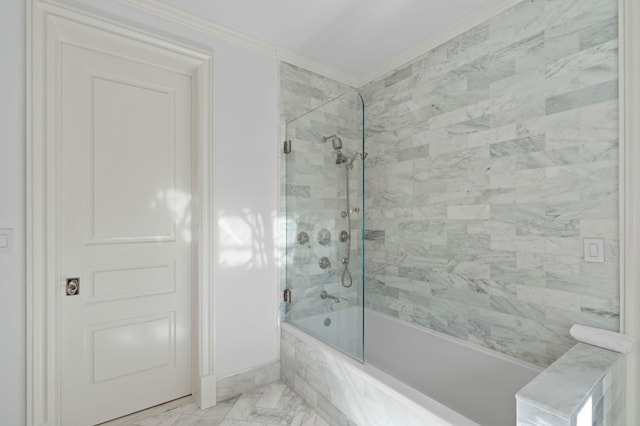 bathroom featuring crown molding and tiled shower / bath combo