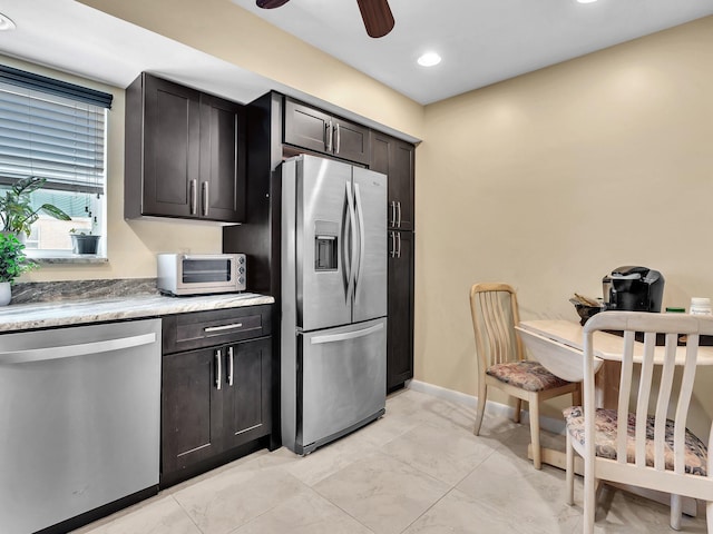 kitchen featuring dark brown cabinetry, ceiling fan, and appliances with stainless steel finishes