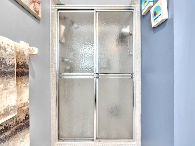 bathroom with an enclosed shower