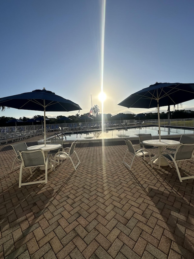 view of patio with a water view