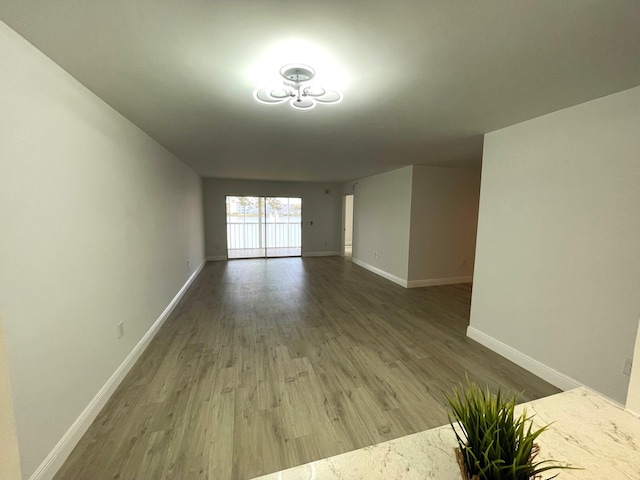 spare room featuring hardwood / wood-style flooring