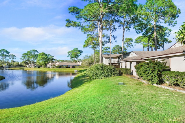 view of yard with a water view