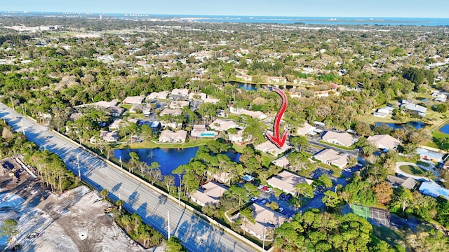 drone / aerial view with a water view