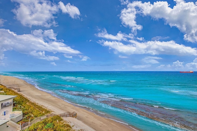 property view of water featuring a beach view