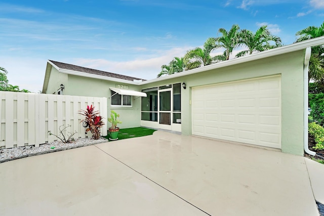 view of front of home with a garage