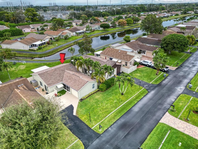 drone / aerial view featuring a water view