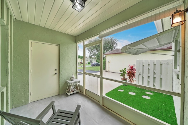 view of unfurnished sunroom