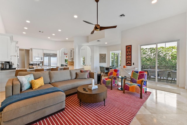 living room featuring ceiling fan