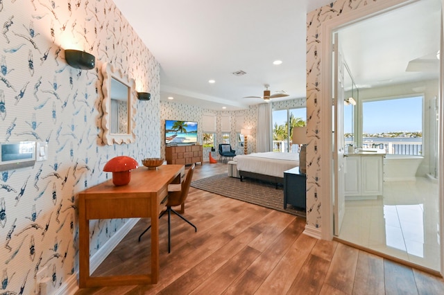 bedroom with hardwood / wood-style floors