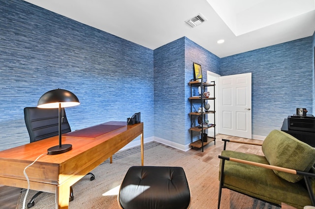 office area with wood-type flooring