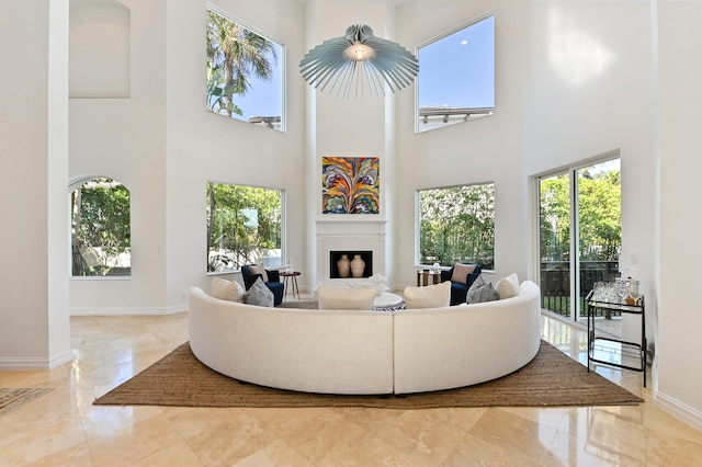 living room with a high ceiling