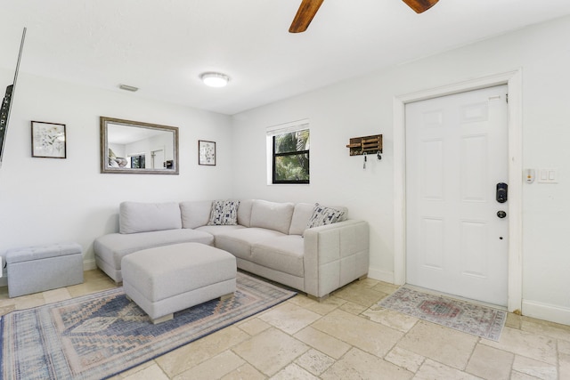 living room with ceiling fan